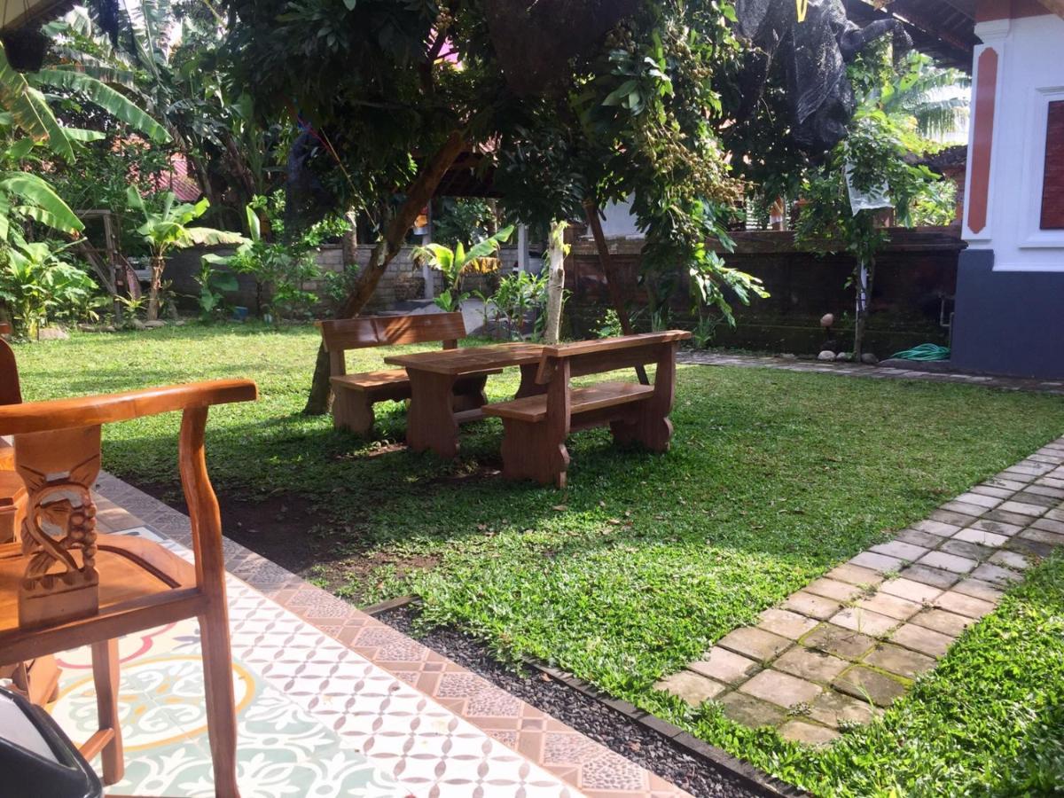 Raditya Homestay Mambal Exterior photo