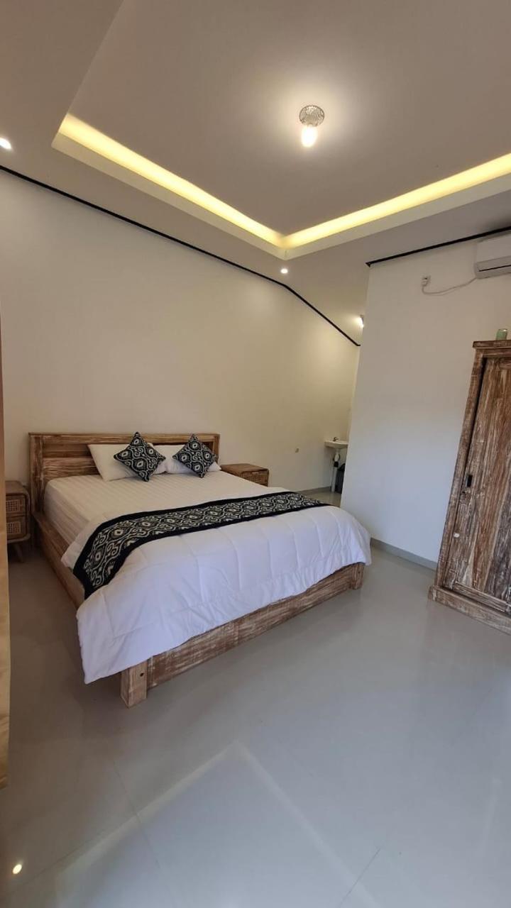 Raditya Homestay Mambal Exterior photo